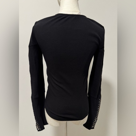 Free People - Woman’s Black top with detail on sleeves
(Listing #43) - Picture 4 of 9